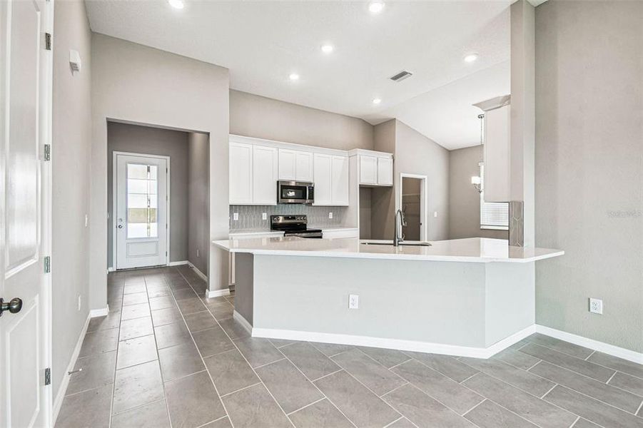 Furnished interior view inside a new home in Pinecone Reserve, Brooksville (Image 8). Furnished interior view inside a new home in Pinecone Reserve, Brooksville (Image 8).