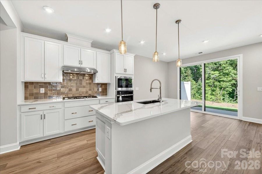 Light filled gourmet kitchen Light filled gourmet kitchen