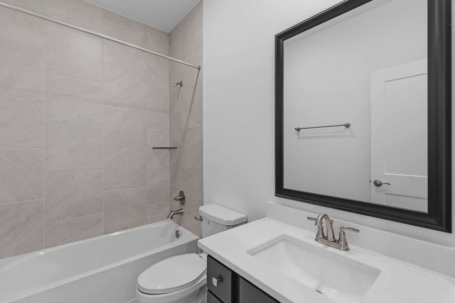 Representative furnished interior of a home built from the Oakdale by Chesmar Homes in Bridgeland, Elgin (Image 12).
