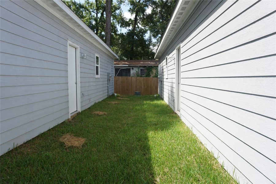 Front exterior of a new home in , Willis, TX, highlighting curb appeal (Image 20).