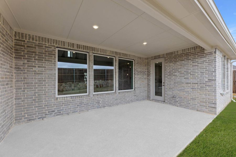 Exterior details and patio area of a home in View at the Reserve, Mansfield (Image 4). Exterior details and patio area of a home in View at the Reserve, Mansfield (Image 4).