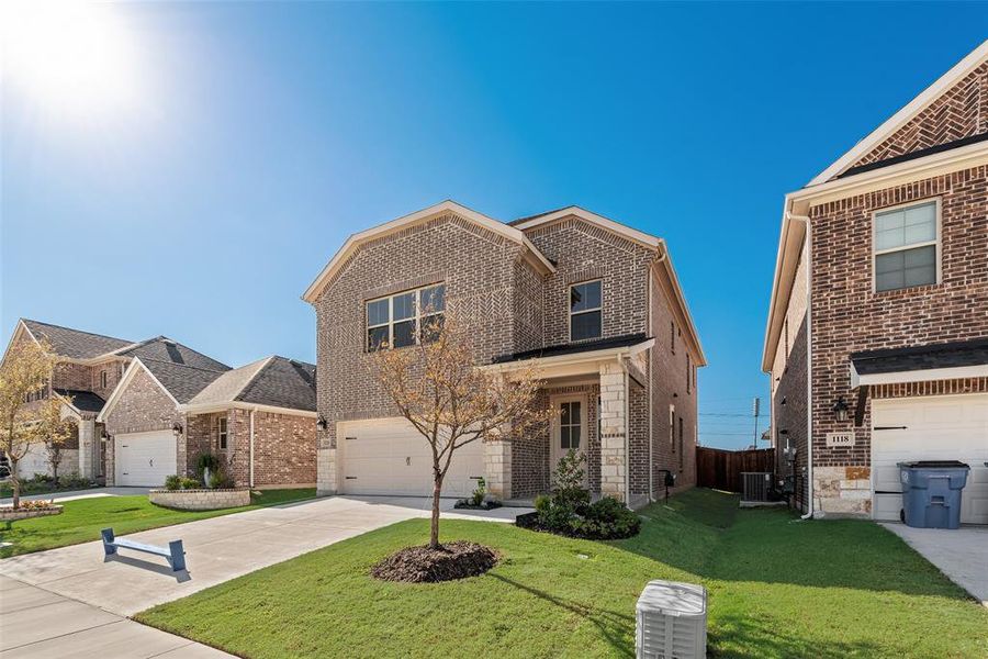 Front exterior of a new home in Walden Pond, Forney, TX, highlighting curb appeal (Image 1).