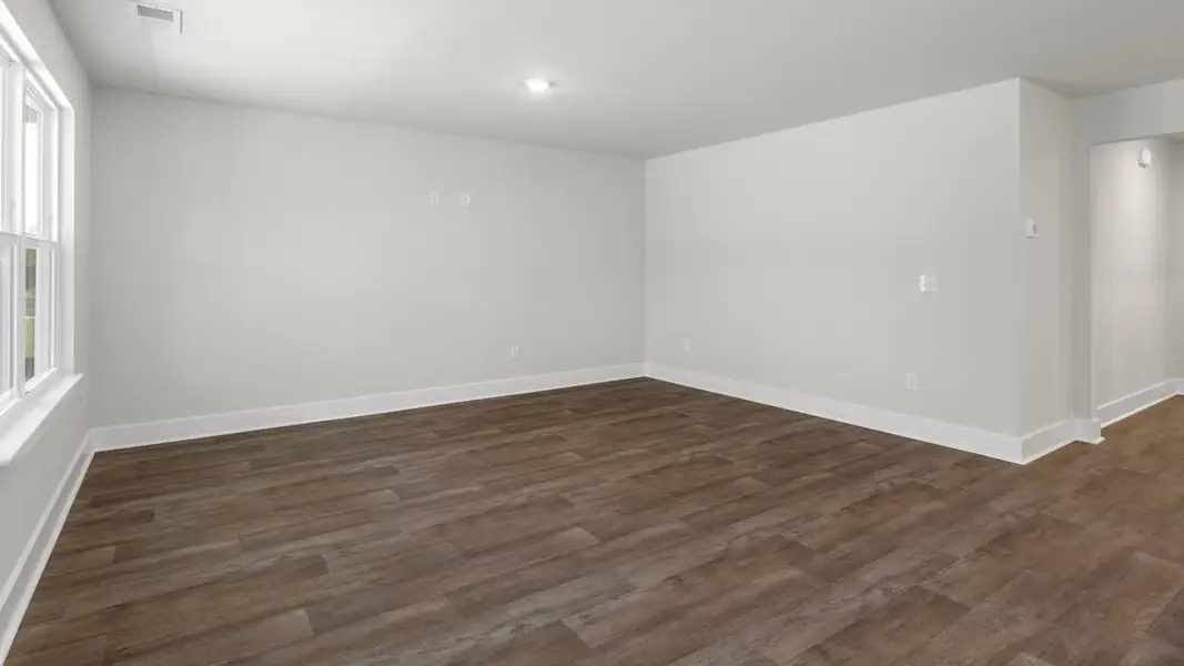 Spacious, unfurnished interior of a new home in Cedar Hill Landing, Navassa (Image 17).