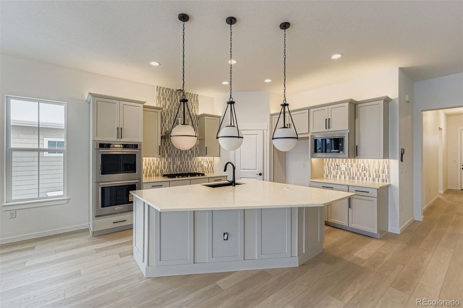 Furnished interior view inside a new home in Hilltop 55+ at Inspiration 55s, Aurora (Image 9).