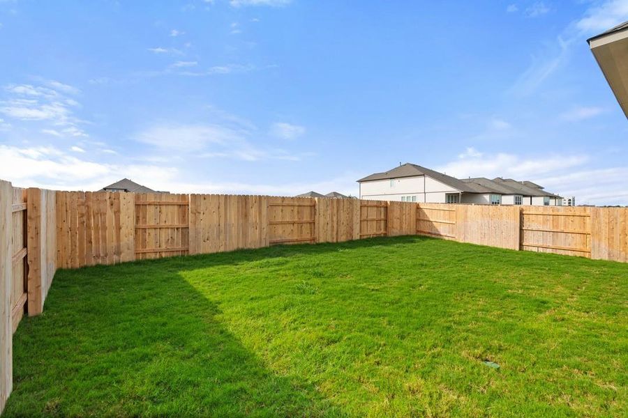 Front exterior of a new home in Arbor Collection At Park Central, Georgetown, TX, highlighting curb appeal (Image 18). Front exterior of a new home in Arbor Collection At Park Central, Georgetown, TX, highlighting curb appeal (Image 18).