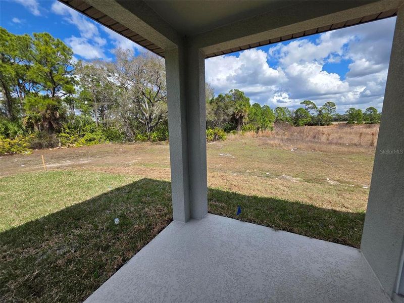 Exterior details and patio area of a home in Magnolia Bay - Classic Series, Nokomis (Image 3).