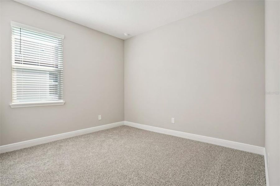 Spacious, unfurnished interior of a new home in Legends Preserve - Signature Series, Daytona Beach (Image 38).