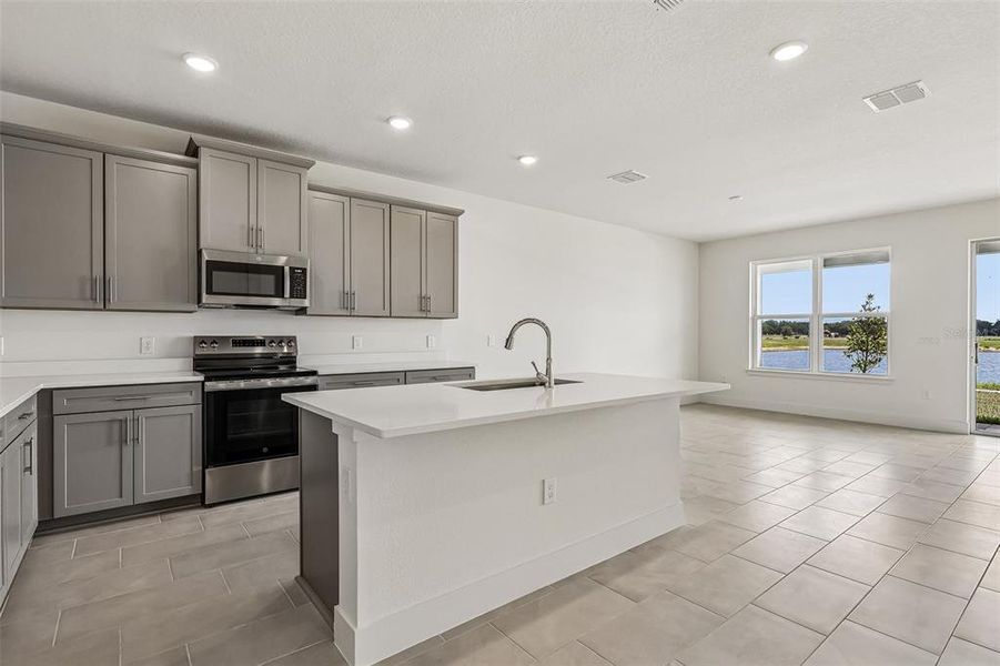 Furnished interior view inside a new home in Lakeside at Satilla, St. Cloud (Image 6).