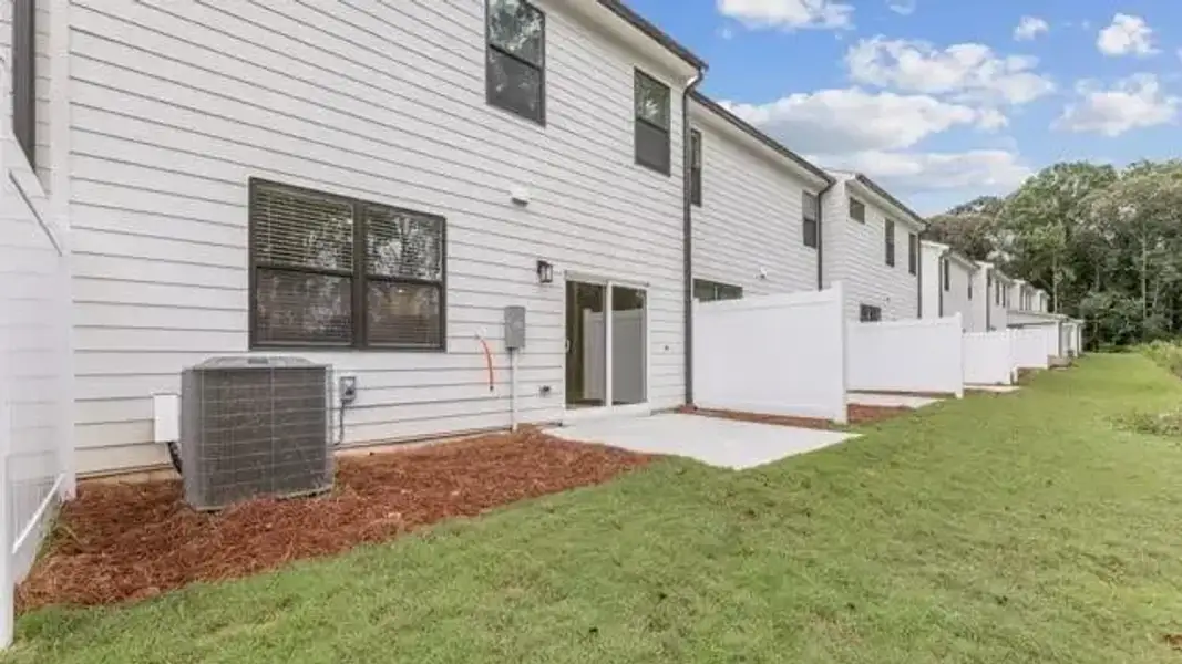 Exterior details and patio area of a home in Sherwood Square, Flowery Branch (Image 3).