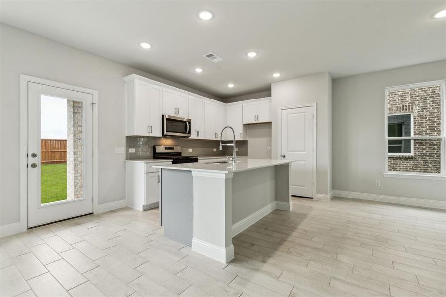 Furnished interior view inside a new home in Santorini, Seagoville (Image 6).