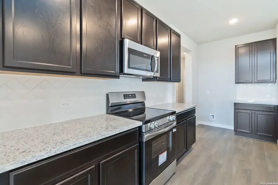 Furnished interior view inside a new home in Hunters Ranch, San Antonio (Image 3).