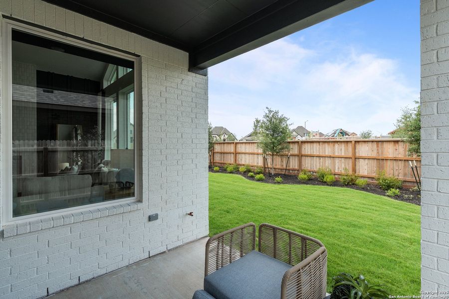 Exterior details and patio area of a home in Stillwater Ranch, San Antonio (Image 22).