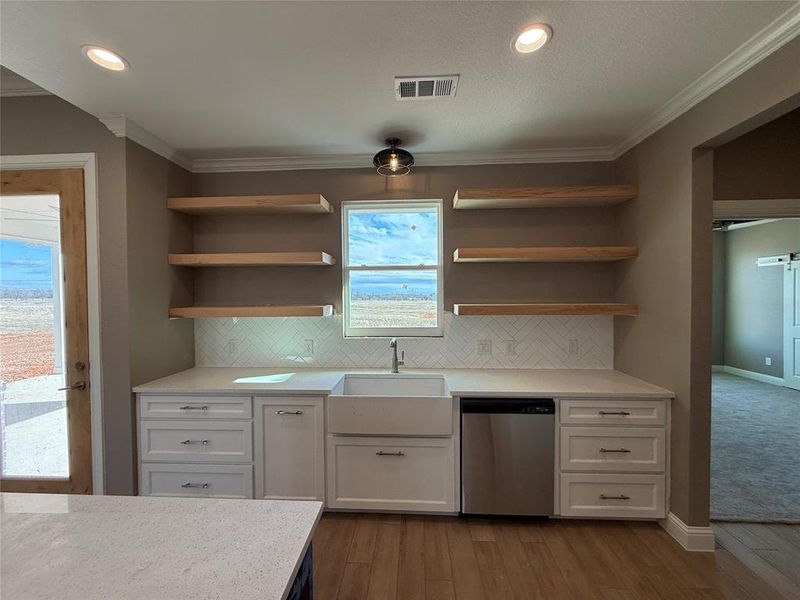 Great view of your backyard from the sink with granite countertops