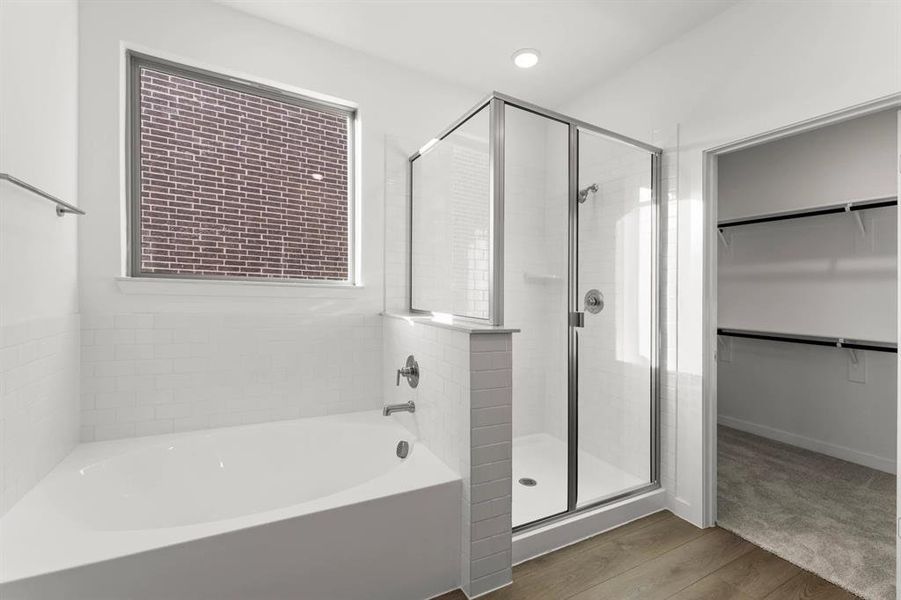 Primary Bathroom featuring a Garden Tub