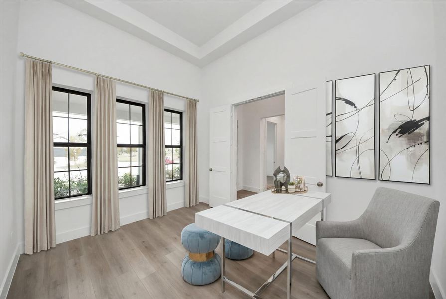 This handsome Study features laminate flooring, large windows, tray ceiling, lighting, custom paint, and double doors for privacy. This handsome Study features laminate flooring, large windows, tray ceiling, lighting, custom paint, and double doors for privacy.