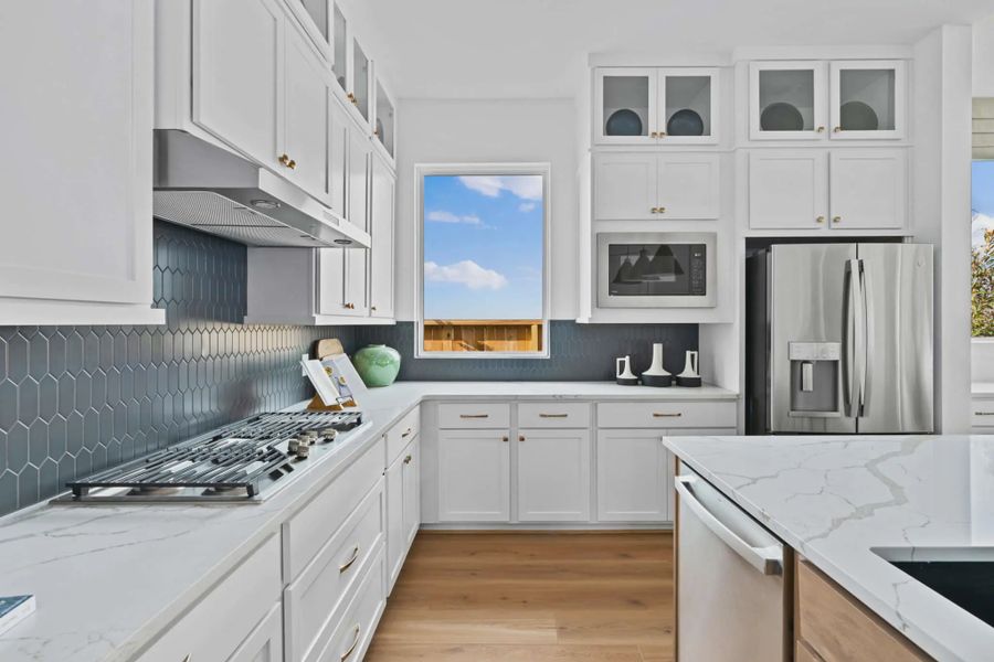 Representative furnished interior of a home built from the Lauren by Chesmar Homes in Wood Leaf Reserve, Tomball (Image 6).