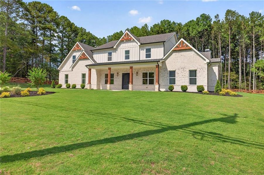 Front exterior of a new home in , Lawrenceville, GA, highlighting curb appeal (Image 27).