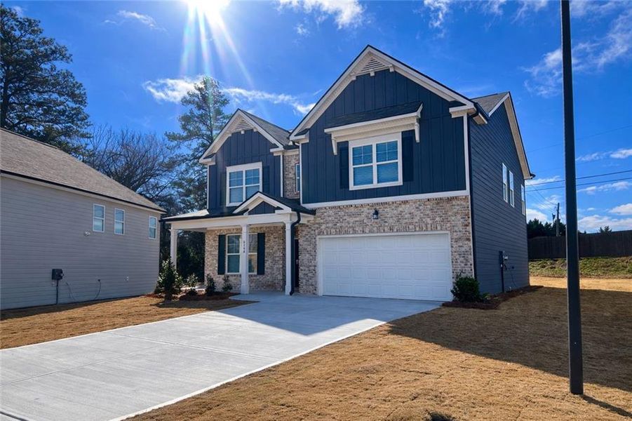 Front exterior of a new home in Stonegate, Atlanta, GA, highlighting curb appeal (Image 15).