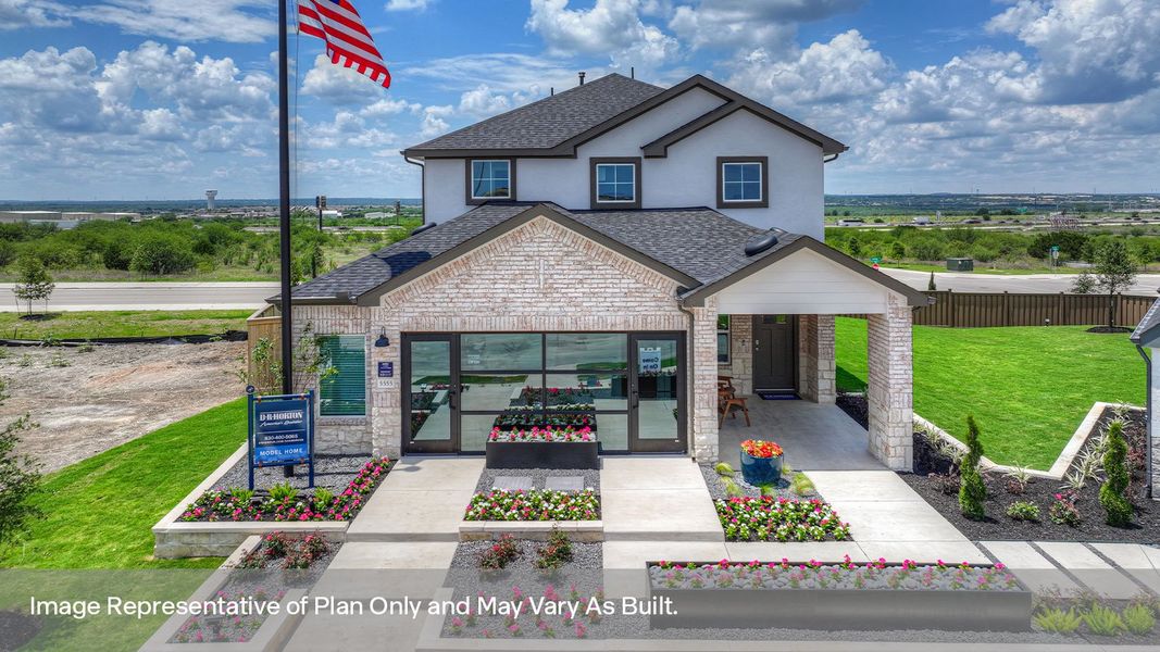 Front exterior of a new home in Mayfair, New Braunfels, TX, highlighting curb appeal (Image 2). Front exterior of a new home in Mayfair, New Braunfels, TX, highlighting curb appeal (Image 2).
