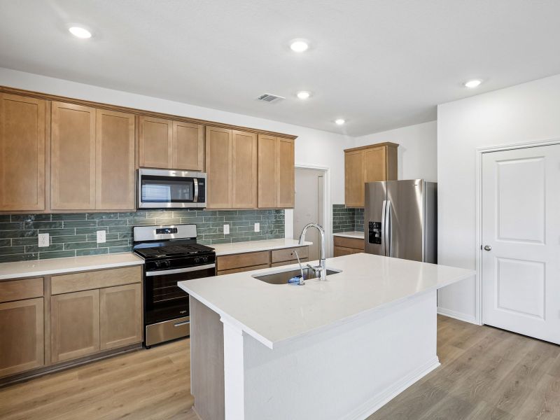 Furnished interior view inside a new home in Pfennig Place, Pflugerville (Image 3).