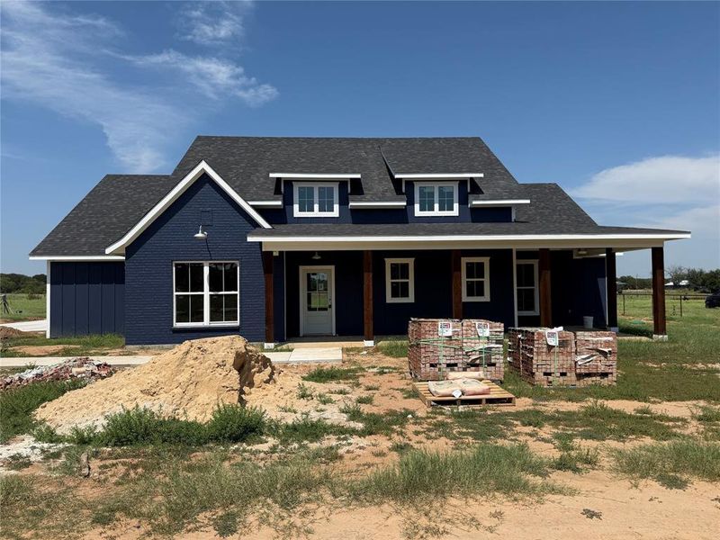 Front exterior of a new home in , Paradise, TX, highlighting curb appeal (Image 2).