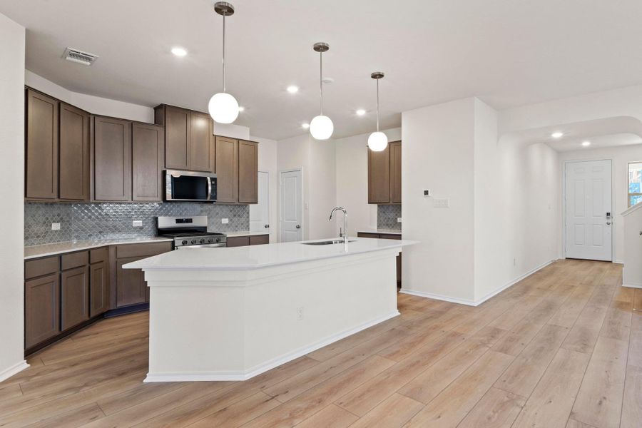 Furnished interior view inside a new home in Salerno - Heritage Collection, Round Rock (Image 13). Furnished interior view inside a new home in Salerno - Heritage Collection, Round Rock (Image 13).