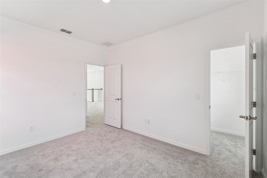 Spacious, unfurnished interior of a new home in Laureate Park at Lake Nona - Garden Series, Orlando (Image 29).