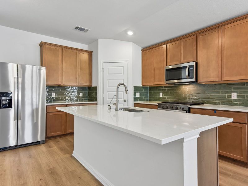 Furnished interior view inside a new home in Lakeside Meadows, Pflugerville (Image 4).