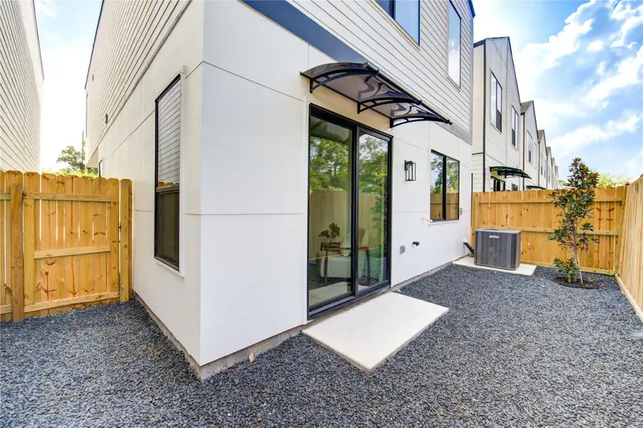 Exterior details and patio area of a home in , Houston (Image 1). Exterior details and patio area of a home in , Houston (Image 1).