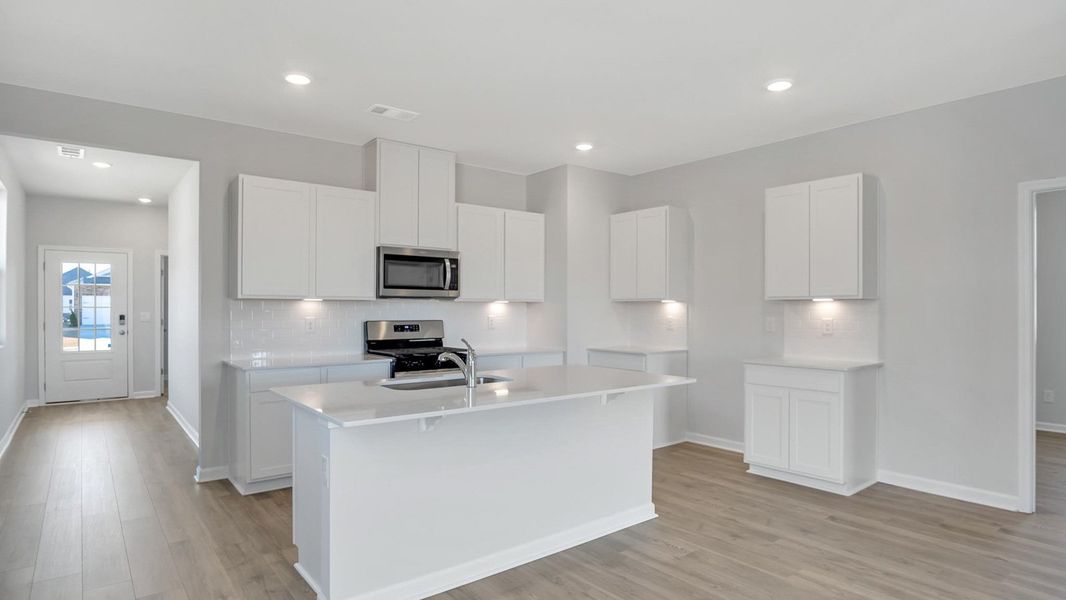 Furnished interior view inside a new home in Nexus South, Gallatin (Image 26).
