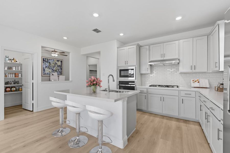 Representative furnished interior of a home built from the Rayburn by Taylor Morrison in Madero 50s, Fort Worth (Image 6).