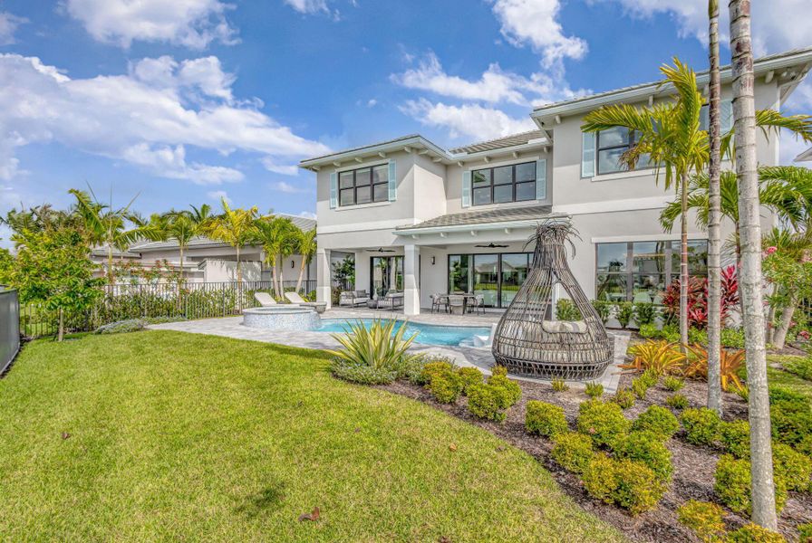 Exterior details and patio area of a home in Apex at Avenir, Palm Beach Gardens (Image 24).