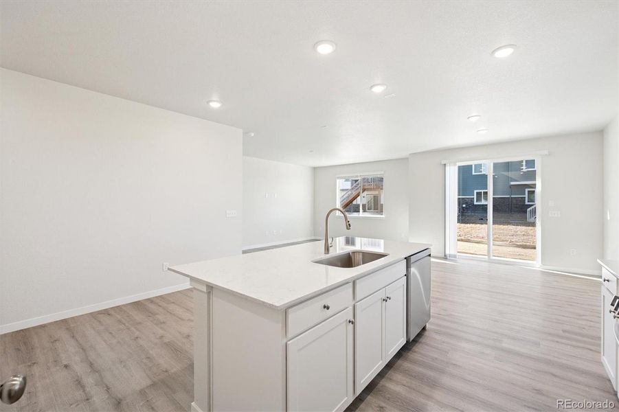 Furnished interior view inside a new home in The Aurora Highlands, Aurora (Image 3).