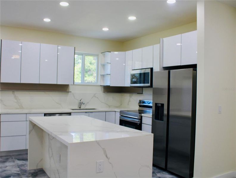 Furnished interior view inside a new home in , Port Charlotte (Image 13).