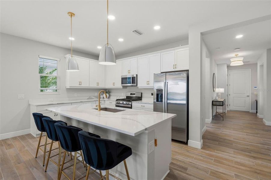 Furnished interior view inside a new home in LakeHouse Cove at Waterside, Sarasota (Image 33). Furnished interior view inside a new home in LakeHouse Cove at Waterside, Sarasota (Image 33).