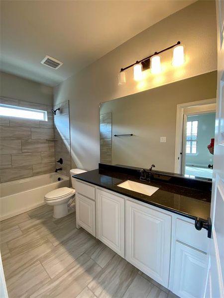 Bath 2 downstairs with natural light Bath 2 downstairs with natural light