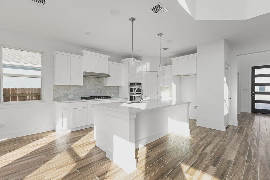 Furnished interior view inside a new home in Enclave at Cele, Pflugerville (Image 7).
