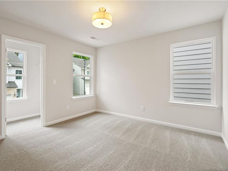 Spacious, unfurnished interior of a new home in The Village at Shallowford, Kennesaw (Image 26).