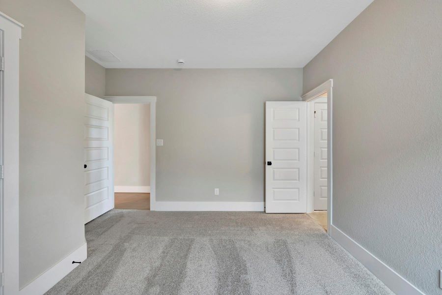 Spacious, unfurnished interior of a new home in Easthaven at Bridgeland Central - Vision Collection, Cypress (Image 29).
