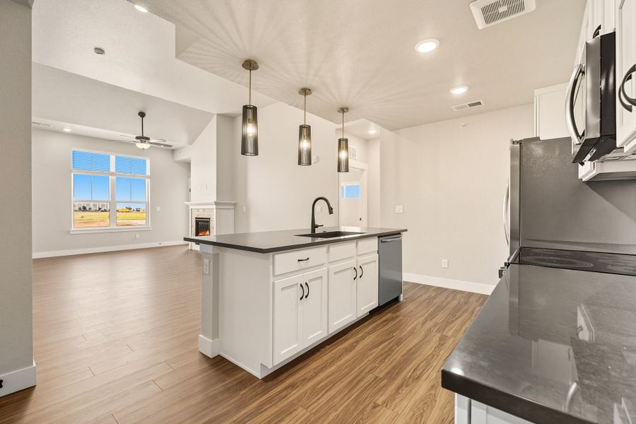 Representative furnished interior of a home built from the The Oxford by Landmark Homes in The Lakes at Centerra, Loveland (Image 4). Representative furnished interior of a home built from the The Oxford by Landmark Homes in The Lakes at Centerra, Loveland (Image 4).