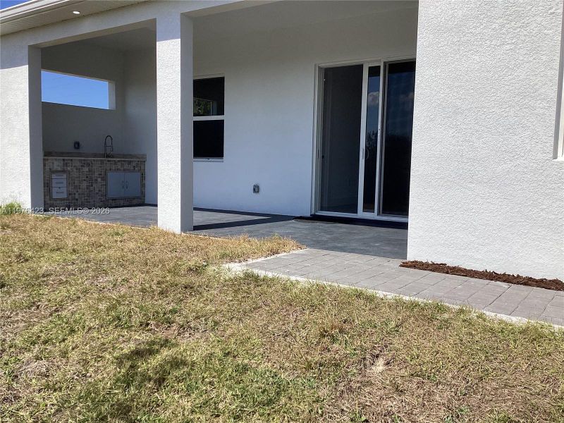 Exterior details and patio area of a home in , Cape Coral (Image 11).