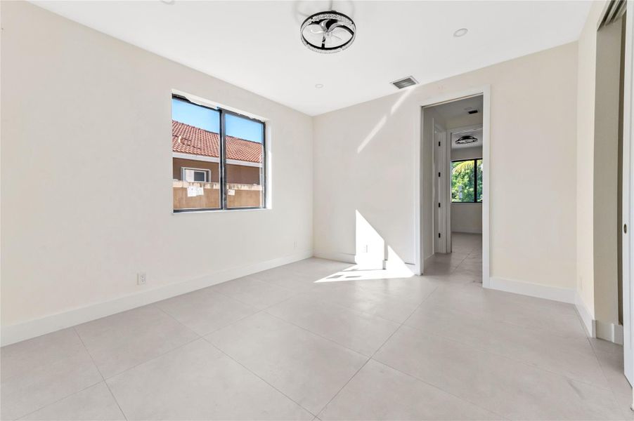 Spacious, unfurnished interior of a new home in , Coconut Creek (Image 45).