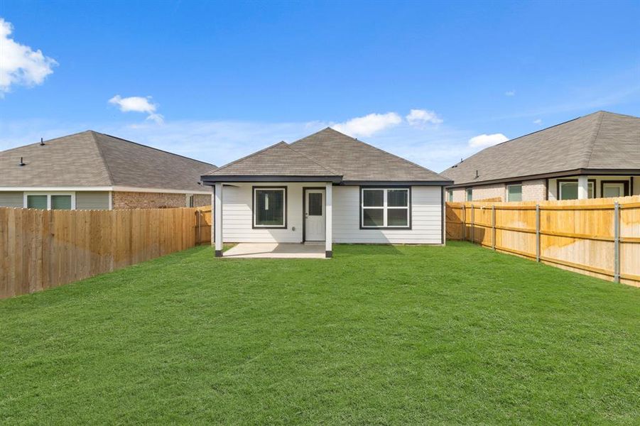 Exterior details and patio area of a home in Christian Meadows, Ennis (Image 2). Exterior details and patio area of a home in Christian Meadows, Ennis (Image 2).