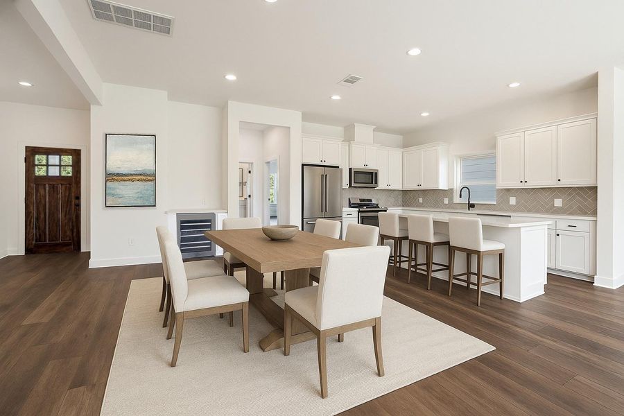 An open floor plan makes living functional and comfy throughout the main floor. This photo has been virtually enhanced. An open floor plan makes living functional and comfy throughout the main floor. This photo has been virtually enhanced.