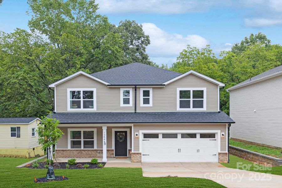 Front exterior of a new home in , Huntersville, NC, highlighting curb appeal (Image 23). Front exterior of a new home in , Huntersville, NC, highlighting curb appeal (Image 23).