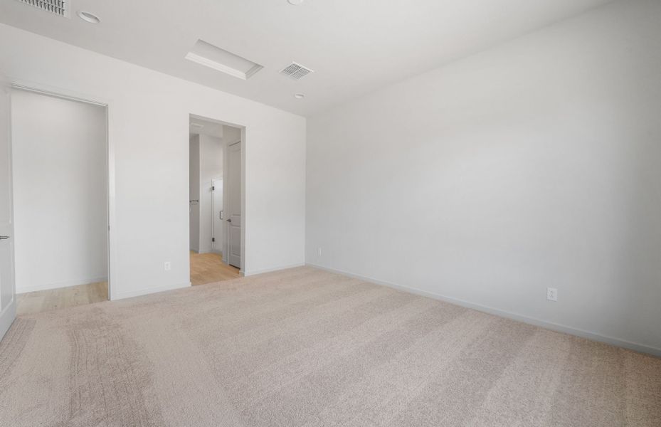 Spacious, unfurnished interior of a new home in Legado West, Queen Creek (Image 25).