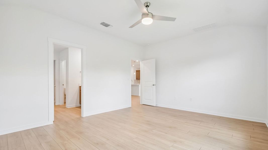 Spacious, unfurnished interior of a new home in Trails at Wildhorse, Austin (Image 26).