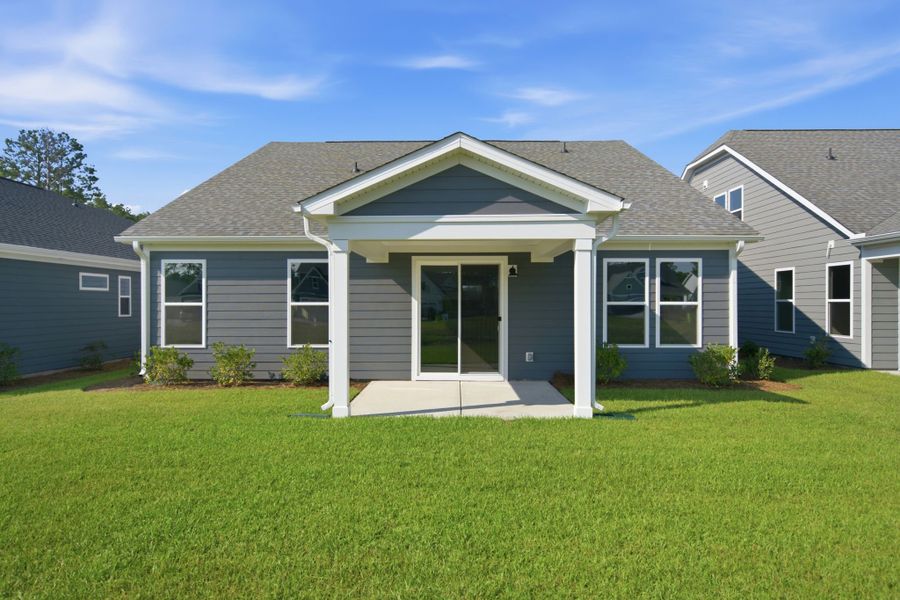 Exterior details and patio area of a home in Terrapin, Leland (Image 2). Exterior details and patio area of a home in Terrapin, Leland (Image 2).