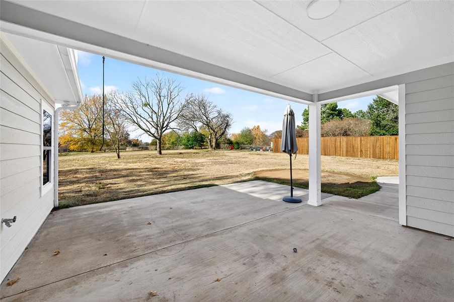 Exterior details and patio area of a home in , Denison (Image 4).