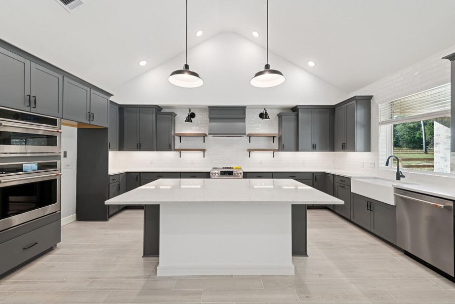 Gourmet island kitchen (*Photo not of actual home and used for illustration purposes only.) Gourmet island kitchen (*Photo not of actual home and used for illustration purposes only.)